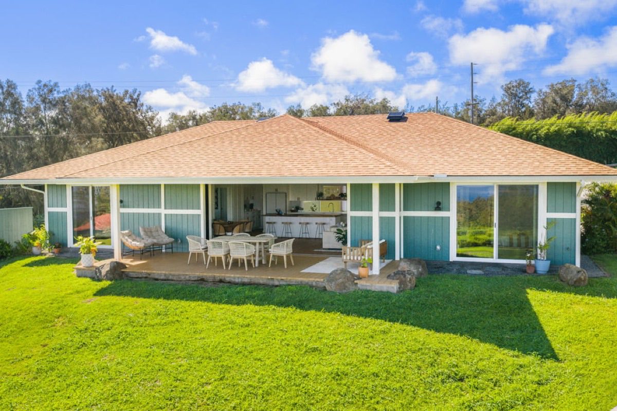 Newly built plantation-style contemporary home with ocean and pasture views in Kapaʻau, North Kohala